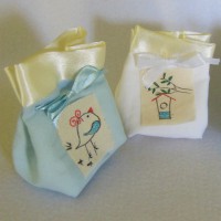 Sacchetti per confetti con quadretto fatto a mano a tema 'uccellini'